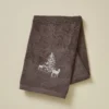 Serviette brodée Trésor des forêts cacao