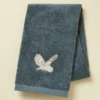 Serviette brodée 50x100 L'envol bleu fumé