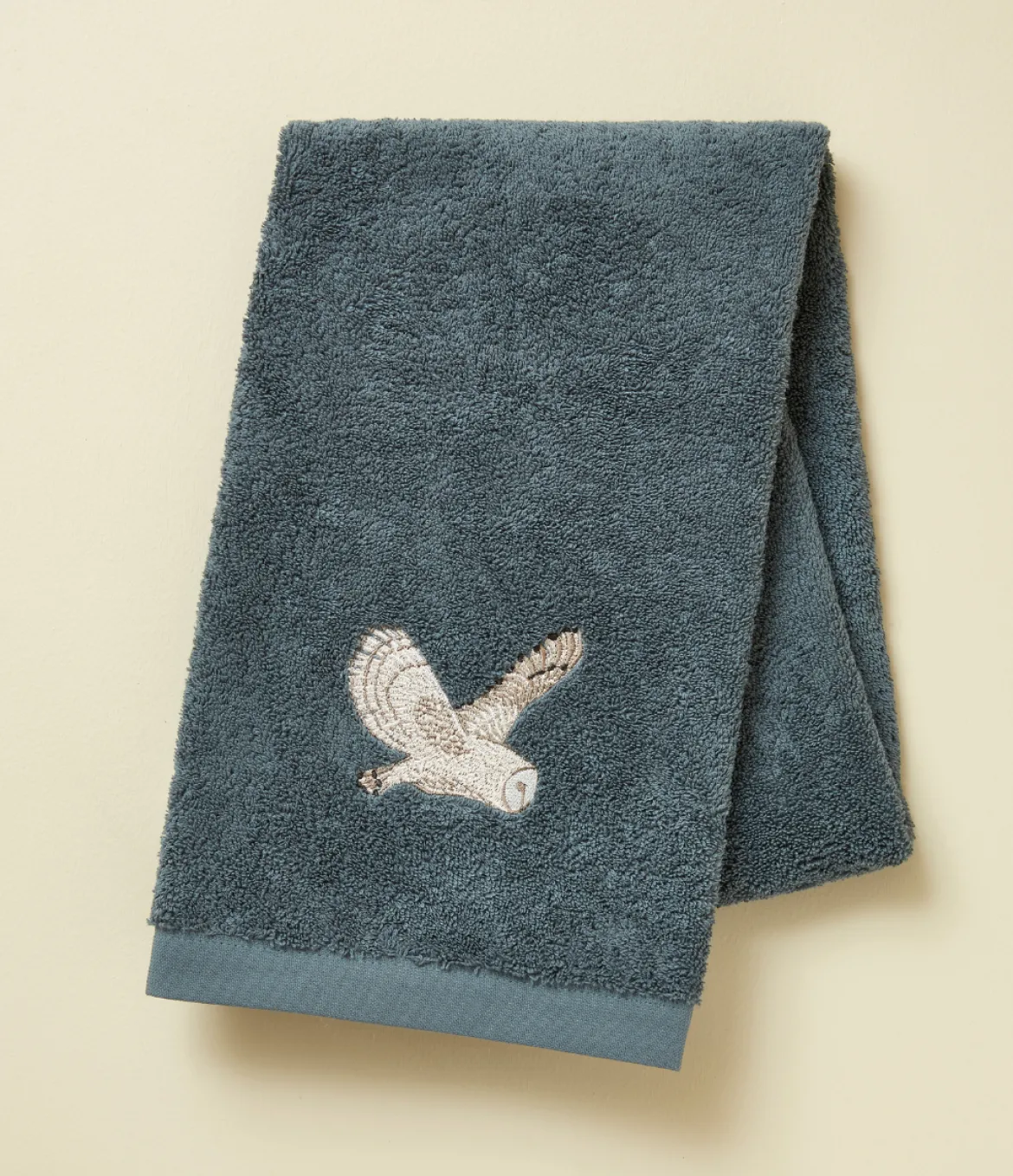 Serviette brodée 50x100 L'envol bleu fumé